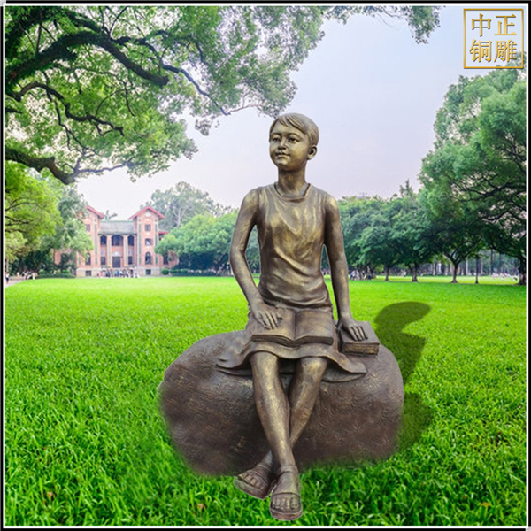 小女孩看書校園銅雕塑